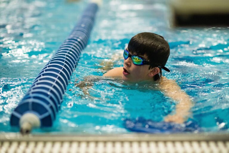 How can personalized swimming lessons in Woodlands help improve my stroke technique?